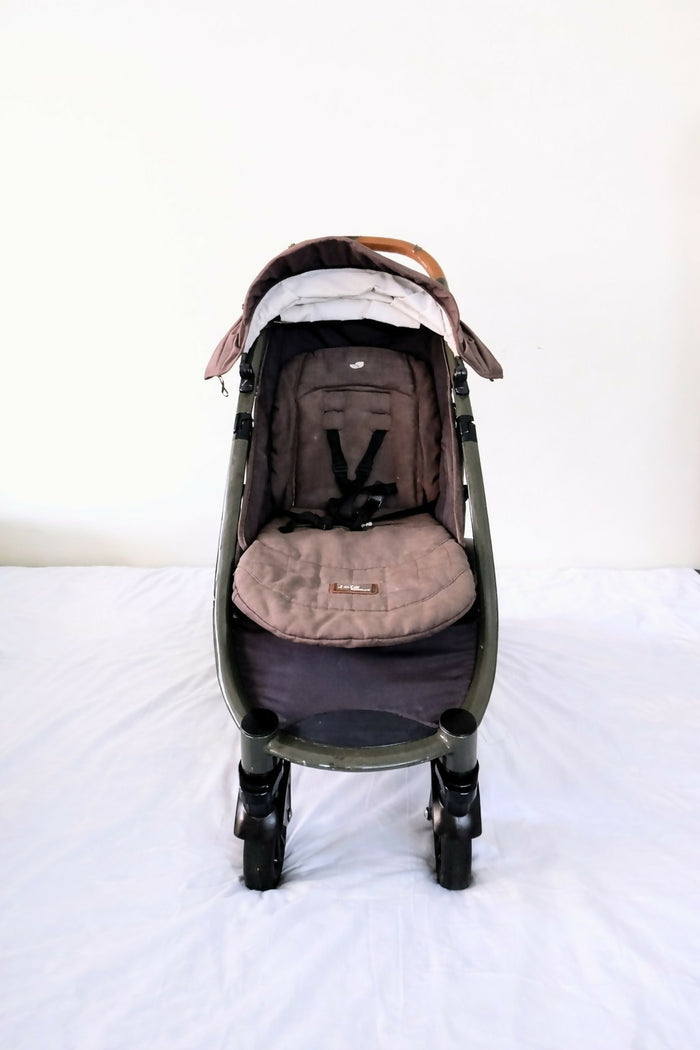 Joie Premium Baby Stroller B010 in Some Used condition, available in Chennai, Tamil Nadu, featuring a lightweight foldable frame, comfortable seat, 5-point safety harness, protective canopy, and smooth wheels for everyday travel.
