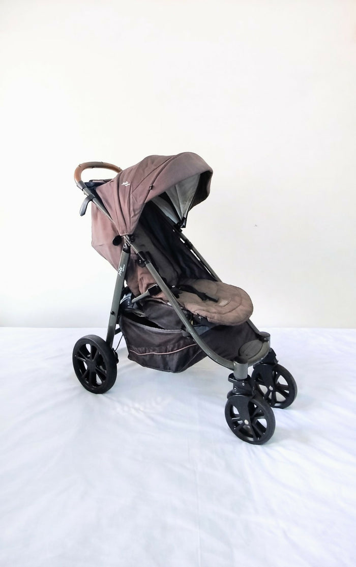 Joie Premium Baby Stroller B010 in Some Used condition, available in Chennai, Tamil Nadu, featuring a lightweight foldable frame, comfortable seat, 5-point safety harness, protective canopy, and smooth wheels for everyday travel.