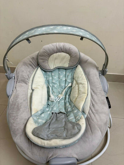Juniors baby rocker, some used condition with slight fabric discoloration, comfortable and sturdy rocker for infants