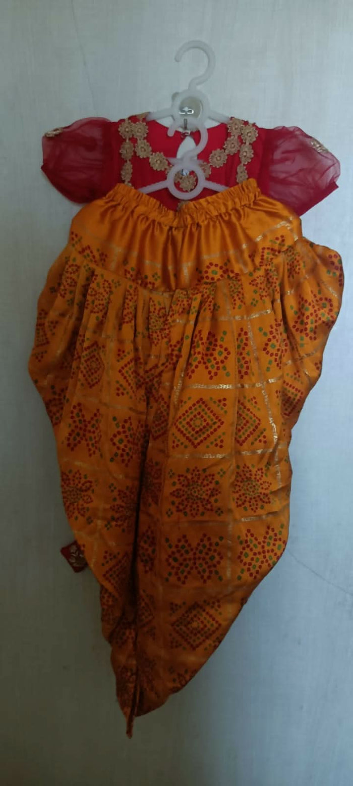 Dress your baby girl in style with our fashionable Kurta and Dhoti Set, designed for comfort and cuteness.