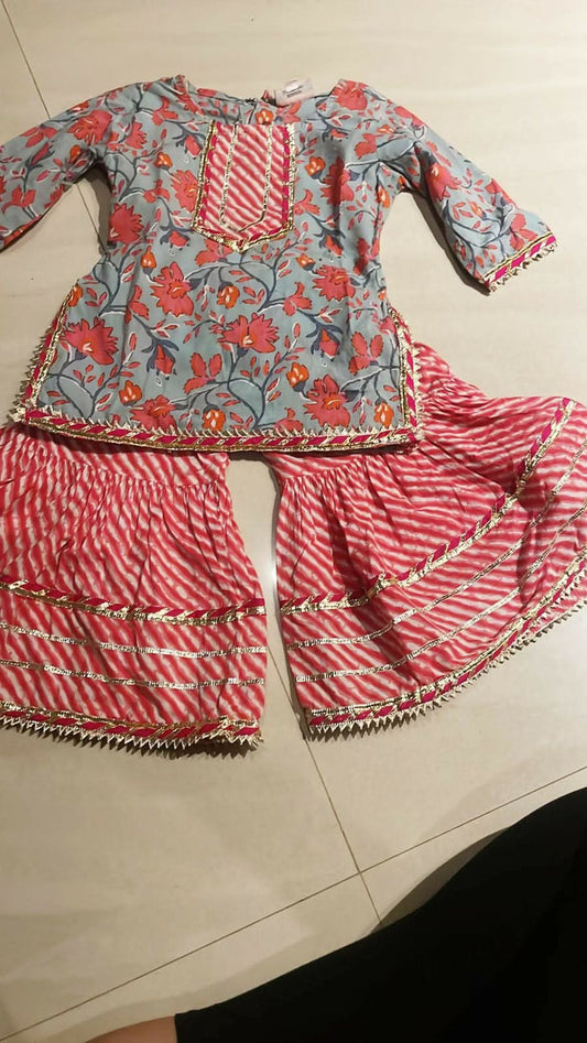 Elevate your baby girl's style with our Kurta and Sharara Set, crafted for traditional charm and comfort.