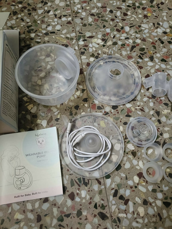 Lifelong Cuppy wearable breast pump with hands-free design, adjustable suction levels, lightweight collection cups, and rechargeable operation for comfortable and discreet milk expression.