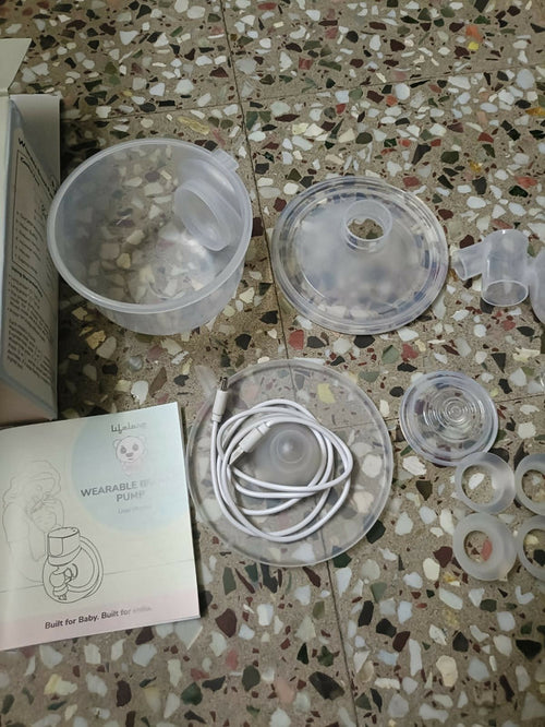 Lifelong Cuppy wearable breast pump with hands-free design, adjustable suction levels, lightweight collection cups, and rechargeable operation for comfortable and discreet milk expression.