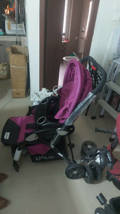 LUVLAP Galaxy Baby Stroller/Pram in Preloved New condition, available in Chennai, featuring a comfortable reclining seat, protective canopy, safety harness, smooth wheels, foldable frame, and convenient storage for baby travel.