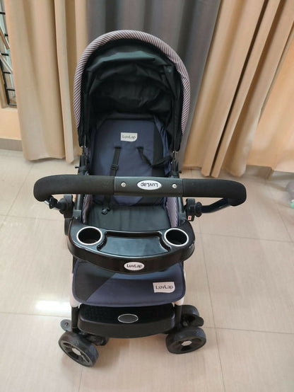 Buy LuvLap Baby Stroller – Safe, foldable pram with reclining seat, safety harness, and storage basket for newborns and toddlers.