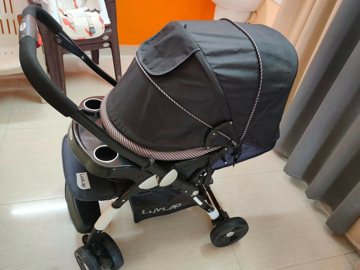 Buy LuvLap Baby Stroller – Safe, foldable pram with reclining seat, safety harness, and storage basket for newborns and toddlers.