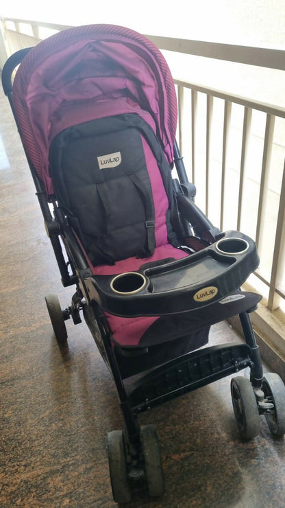 LUVLAP Galaxy Baby Stroller/Pram in Some Used condition featuring a comfortable reclining seat, protective canopy, safety harness, smooth wheels, foldable frame, and convenient storage for everyday outings and travel.