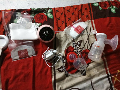 LUVLAP Single Electric Breast Pump with adjustable suction levels, soft silicone massage cushion, quiet operation, rechargeable design, BPA-free components, and ergonomic controls for comfortable and efficient milk expression.