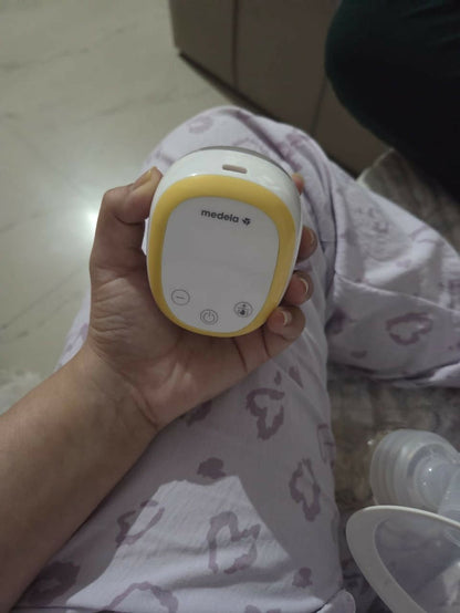Medela electric breast pump, Medela breast pump for nursing mothers, portable electric breast pump, Medela milk pump, efficient breast pump for travel, quiet breast pump for moms