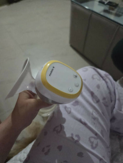 Medela electric breast pump, Medela breast pump for nursing mothers, portable electric breast pump, Medela milk pump, efficient breast pump for travel, quiet breast pump for moms