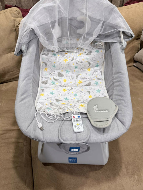 MEE MEE Electric Baby Swing (0–2 Years) with gentle automatic swinging, comfortable padded seat, adjustable recline, safety harness, soothing music, and sturdy frame for relaxing and entertaining babies.