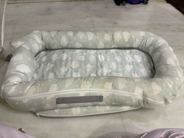 Mothercare Baby Cocoon with soft cushioned fabric, snug wrap design, and cozy support to keep newborns comfortable during sleep, rest, and travel.