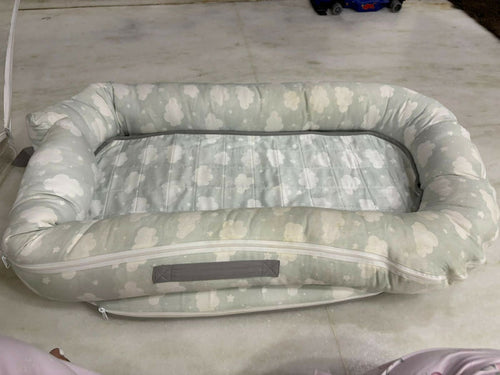 Mothercare Baby Cocoon with soft cushioned fabric, snug wrap design, and cozy support to keep newborns comfortable during sleep, rest, and travel.