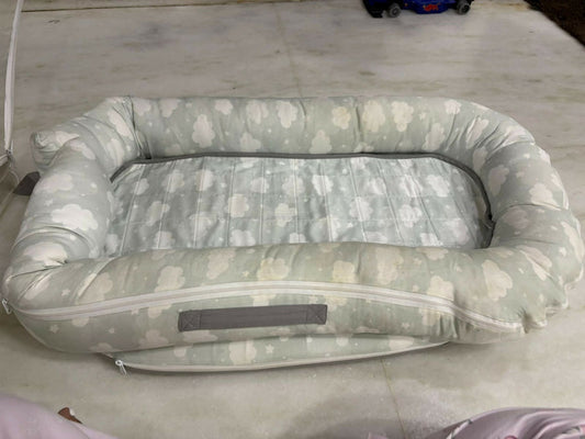 Mothercare Baby Cocoon with soft cushioned fabric, snug wrap design, and cozy support to keep newborns comfortable during sleep, rest, and travel.