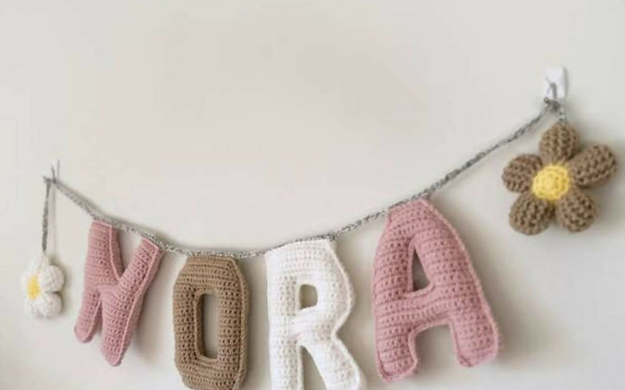 Personalised name hanging – custom wall or door decor that adds a unique touch to your baby’s space.