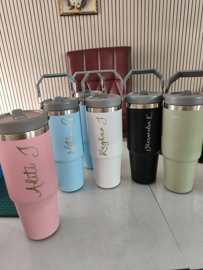 Set of colorful tumblers with handles