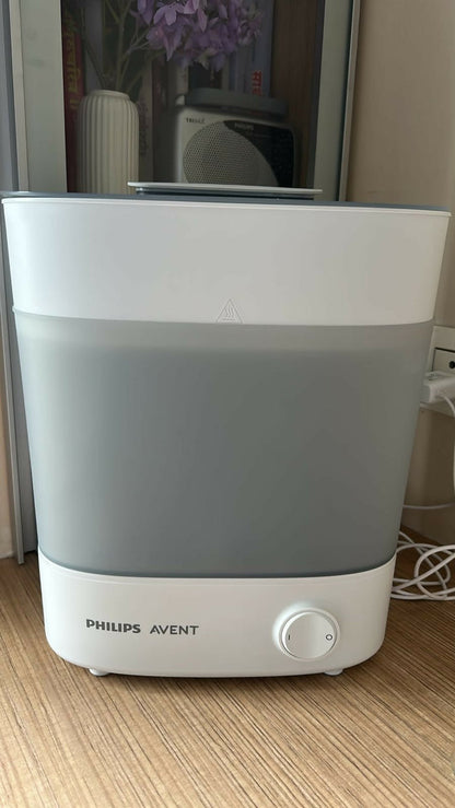 PHILIPS AVENT Steriliser/Sterilizer for baby bottles and feeding accessories with efficient steam sterilization, spacious capacity, BPA-free compatibility, and a compact design for hygienic everyday use.