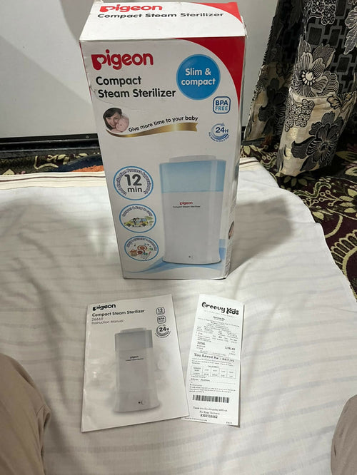 PIGEON Compact Steam Steriliser/Sterilizer for baby bottles and feeding accessories, featuring an efficient steam sterilization system, compact space-saving design, and convenient everyday use for maintaining feeding hygiene.