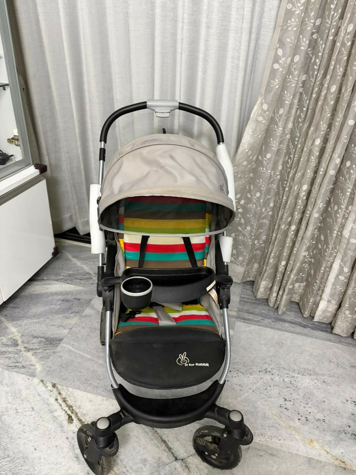 R FOR RABBIT Chocolate Ride Baby Stroller/Pram in Some Used condition, available in Ahmedabad, featuring comfortable seating, reclining backrest, protective canopy, safety harness, smooth wheels, and foldable design.