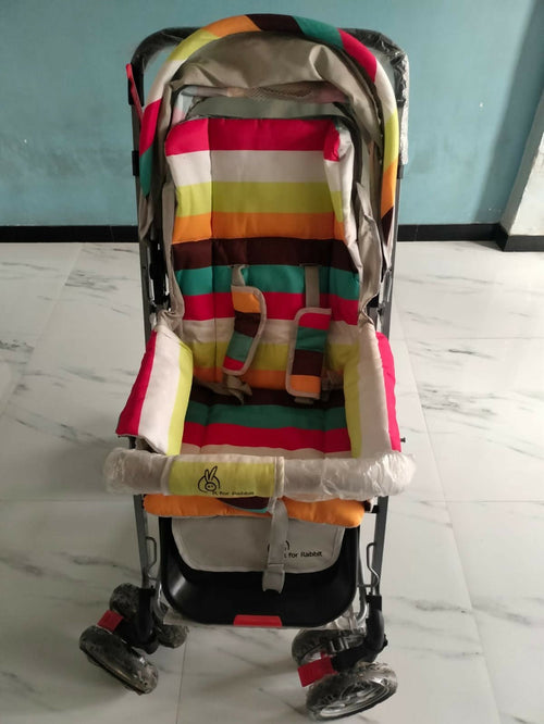 R for Rabbit Lollipop Lite baby stroller/pram with lightweight foldable design, reclining seat, adjustable canopy, 5-point safety harness, smooth wheels, and storage basket for comfortable everyday travel.