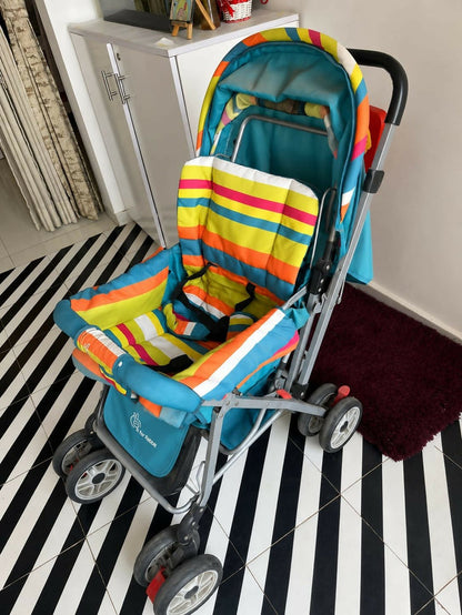 R for Rabbit Lollipop Lite baby stroller/pram with a lightweight foldable design, reclining seat, adjustable canopy, 5-point safety harness, smooth wheels, and storage basket for comfortable travel with babies and toddlers.
