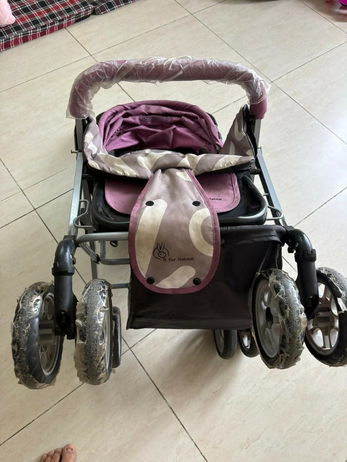 R for Rabbit Lollypop Lite baby stroller/pram with lightweight foldable design, reclining seat, adjustable canopy, 5-point safety harness, smooth wheels, and storage basket for comfortable everyday travel.