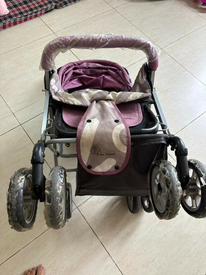 R for Rabbit Lollypop Lite baby stroller/pram with lightweight foldable design, reclining seat, adjustable canopy, 5-point safety harness, smooth wheels, and storage basket for comfortable everyday travel.