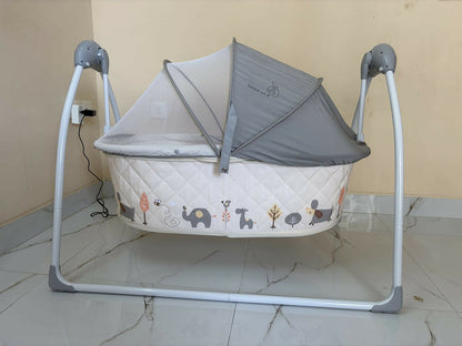 R for Rabbit Lullabies baby automatic electric cradle with gentle rocking motion, cozy sleeping space, secure design, soothing comfort, and automatic swing support for baby sleep.