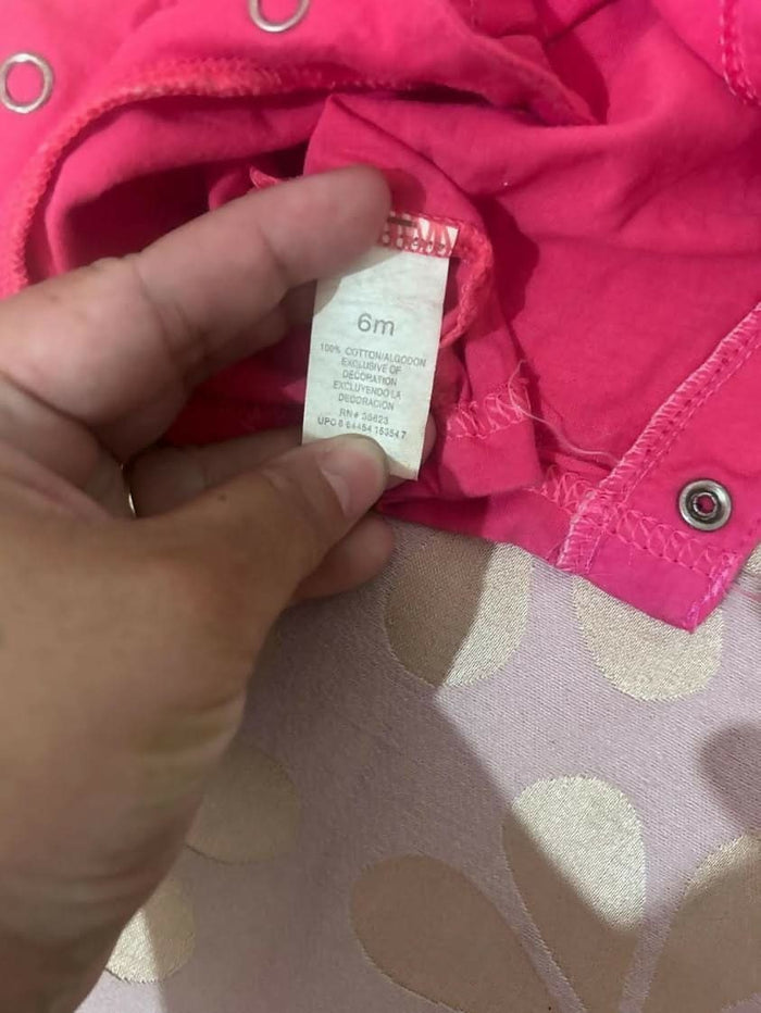 Set of 2 Rompers for baby girls, featuring soft, breathable fabric and easy snap closures for comfort and convenience.