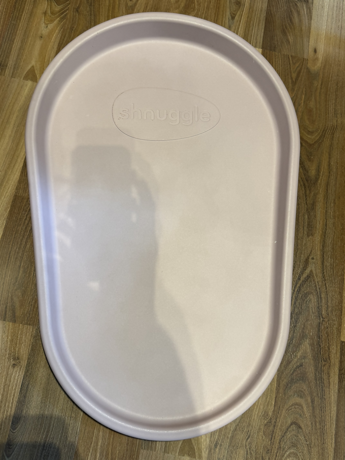 SHNUGGLE Squishy Diaper Changing Mat in Almost New condition featuring a soft cushioned surface, waterproof easy-clean design, raised sides, and comfortable support for convenient everyday baby diaper changes.