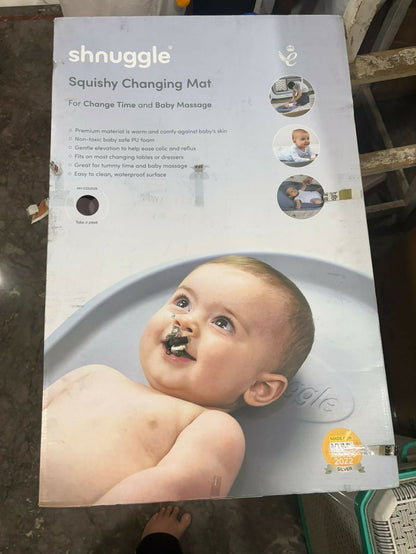 SHNUGGLE Squishy Diaper Changing Mat in Almost New condition featuring a soft cushioned surface, waterproof easy-clean design, raised sides, and comfortable support for convenient everyday baby diaper changes.