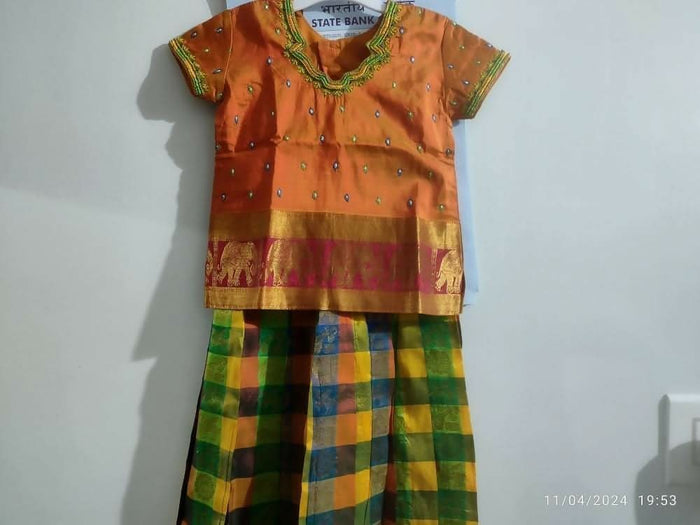 Dress your little girl in luxury and elegance with our Silk Lehenga and Blouse set, perfect for special occasions and celebrations.