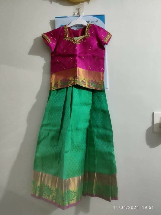 Dress your little girl in luxury and elegance with our Silk Lehenga and Blouse set, perfect for special occasions and celebrations.