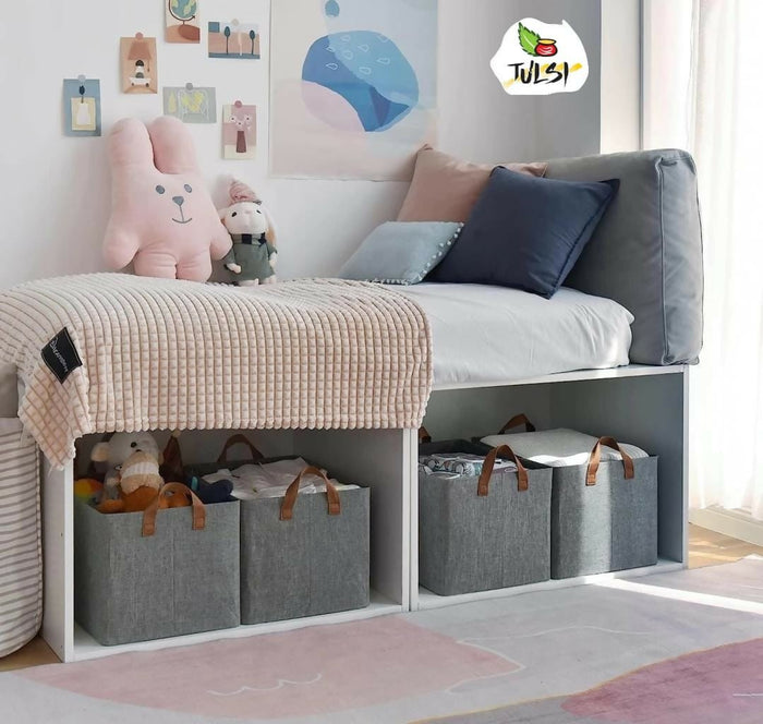 Children's room with a bench, storage bins, and toys.