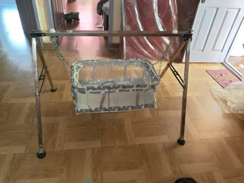 Steel Cradle for Baby featuring a sturdy metal frame, comfortable sleeping space, gentle rocking design, and durable construction for soothing and resting newborns and infants.