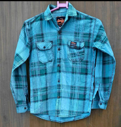 SUPERDRY Boys Shirt in Some Used condition, available in Delhi, featuring a stylish casual design, comfortable fit, and versatile look for everyday wear, outings, parties, and casual occasions.
