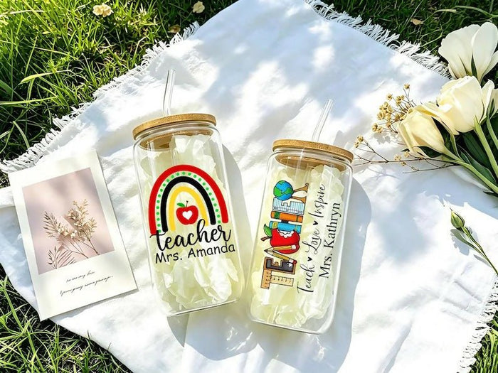 Teacher's Day Special Personalized Glass Tumbler with custom teacher name or message, reusable steel straw, secure lid, and stylish transparent design for everyday drinks and thoughtful teacher gifting.
