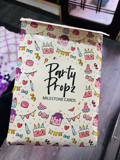 Pack of milestone cards with colorful party-themed design