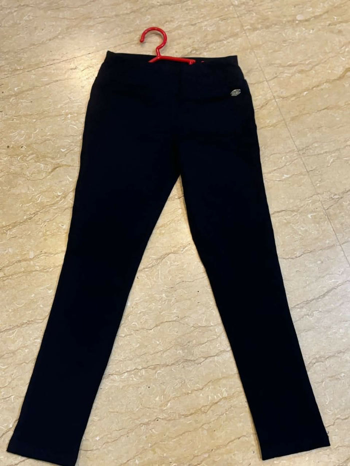 TINY GIRL Blue stretchable jeggings for girls, offering a stylish, comfortable fit with an elastic waistband, perfect for any occasion.