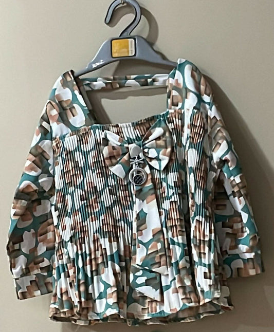 Elevate your baby girl's style with our charming collection of tops—crafted for comfort and designed to enchant!