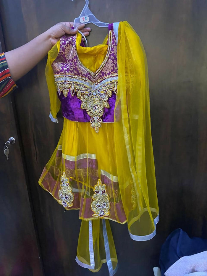 Dress your little one in this vibrant Yellow and Purple Traditional Chaniya Choli for a stunning, festive look!